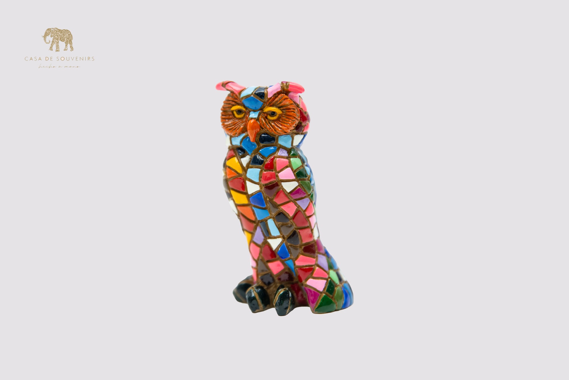 A Charming owl figurine, handcrafted in Spain and entirely hand-painted with a stunning mosaic pattern in vibrant.