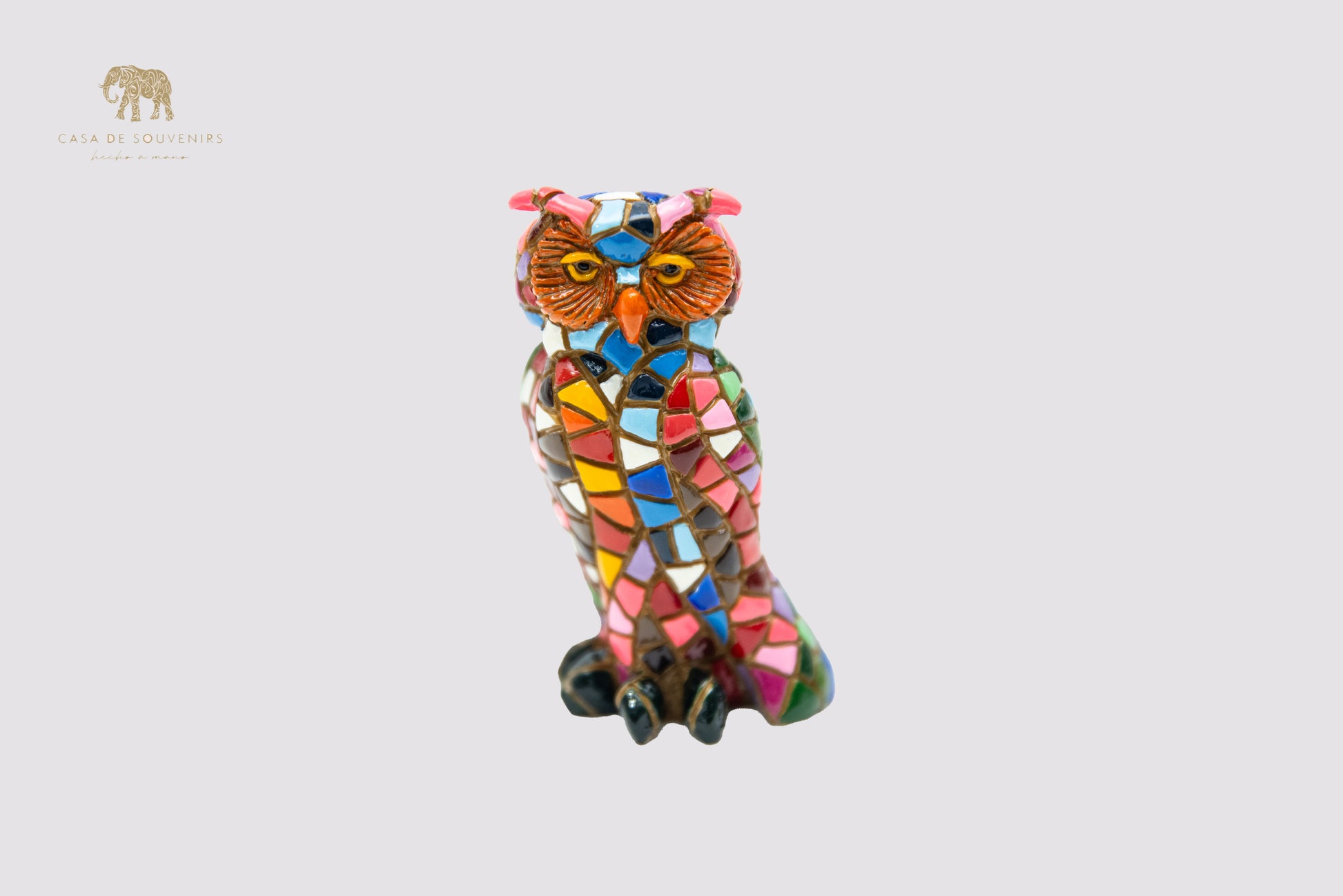 A Charming owl figurine, handcrafted in Spain and entirely hand-painted with a stunning mosaic pattern in vibrant.