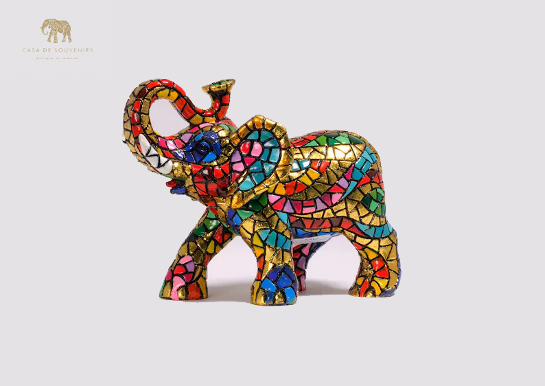 Golden Elephant statue made with marble dust and with enamel. It's the best collection in Spain.