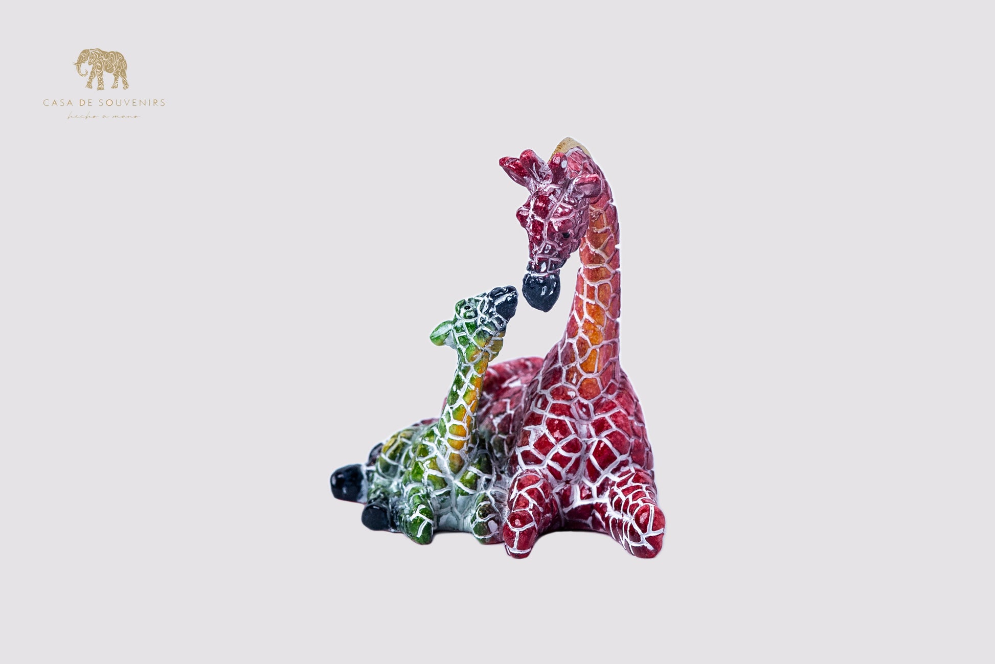 Couple giraffe Mix Colores statue made with marble dust and with enamel. It's the best collection in Spain.