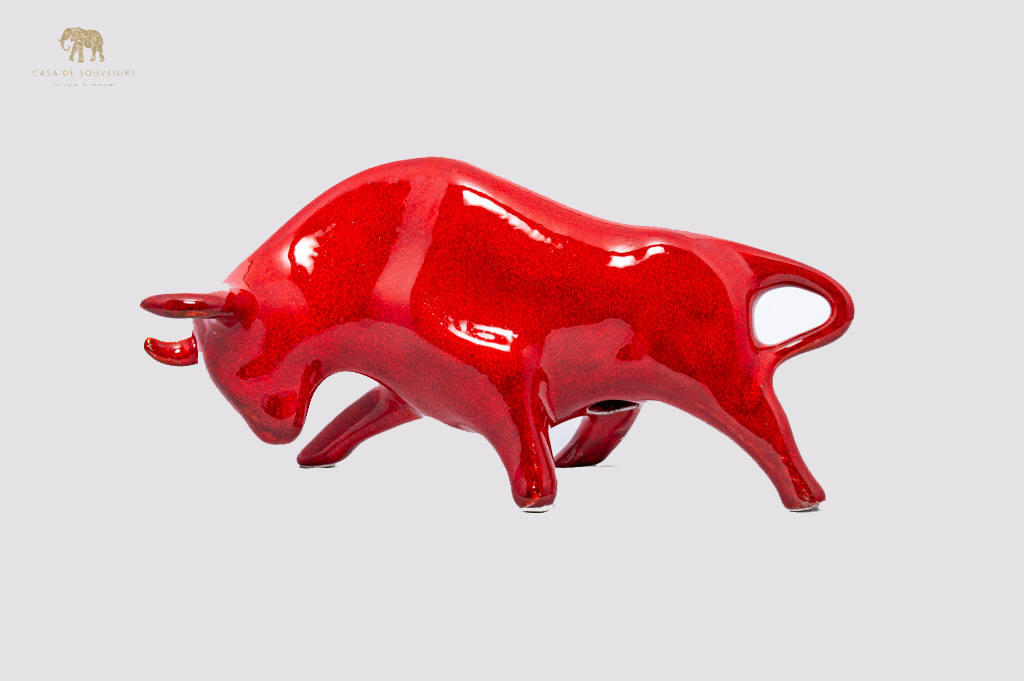 Red Porcelain Bull statue made with porcelain dust and with enamel. It's the best collection in Spain.