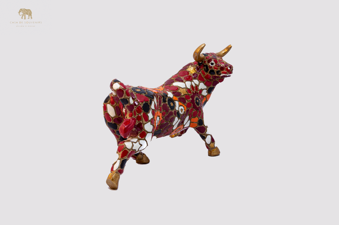 Hand Painted Red Bull statue with Red And White Tail made with marble dust and with enamel. It's the best collection in Spain.