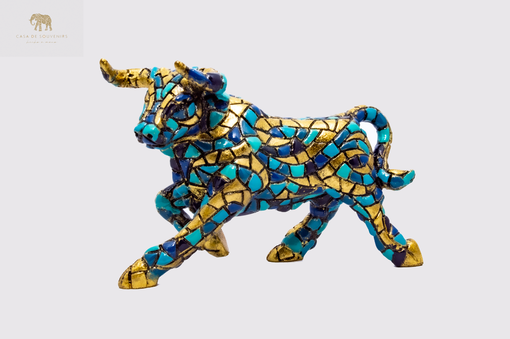 Golden Blue Bull statue made with marble dust and with enamel. It's the best collection in Spain.