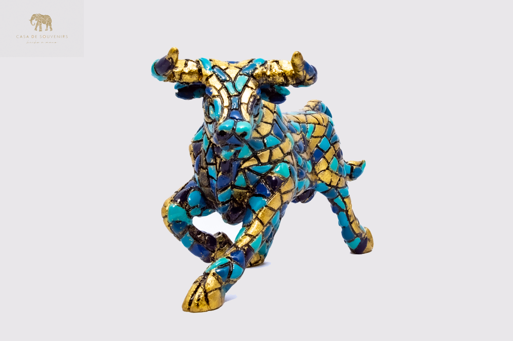 Golden Blue Bull statue made with marble dust and with enamel. It's the best collection in Spain.