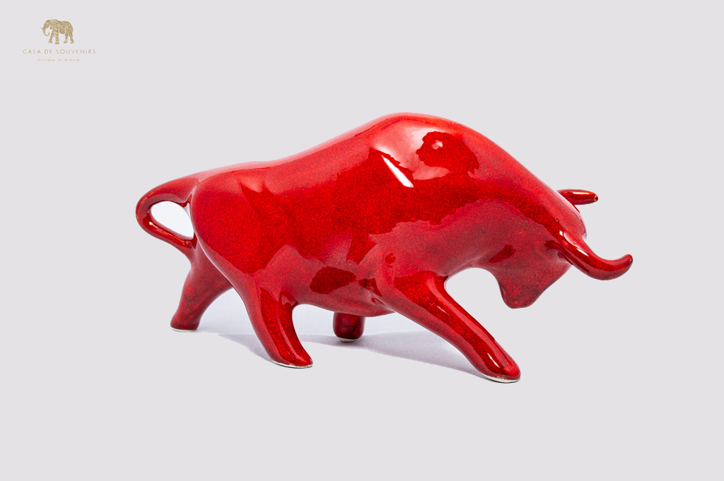 Red Porcelain Bull statue made with porcelain dust and with enamel. It's the best collection in Spain.