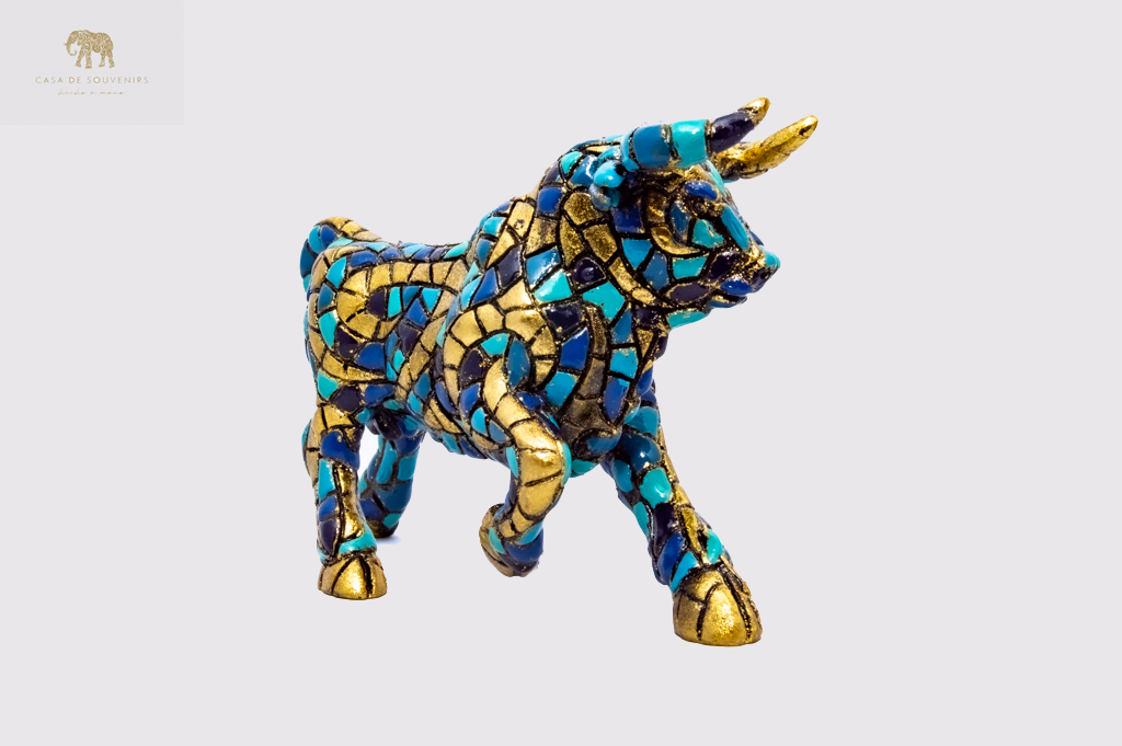Golden Blue Bull statue made with marble dust and with enamel. It's the best collection in Spain.