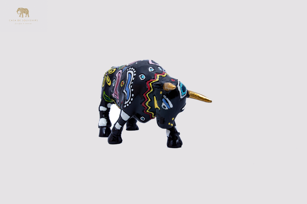 Hand Painted Black Bull statue with Gold Horns Tail made with marble dust and with enamel. It's the best collection in Spain.