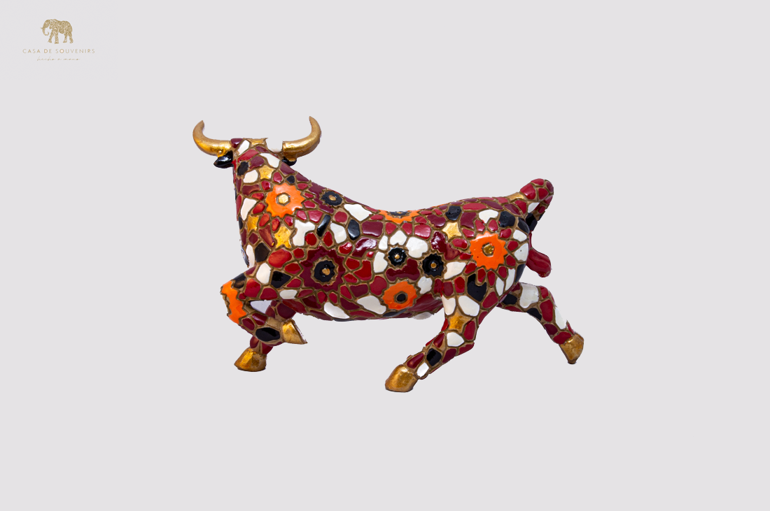 Hand Painted Red Bull statue with Red And White Tail made with marble dust and with enamel. It's the best collection in Spain.