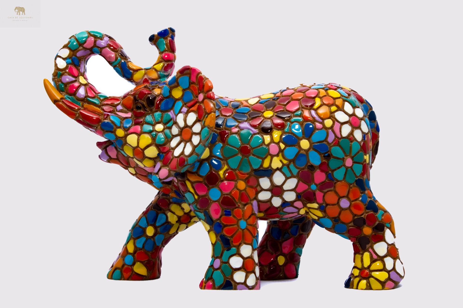 Flower Colores Elephant statue made with marble dust and with enamel. It's the best collection in Spain.