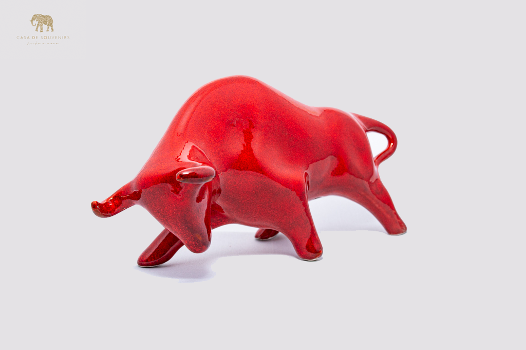 Red Porcelain Bull statue made with porcelain dust and with enamel. It's the best collection in Spain.