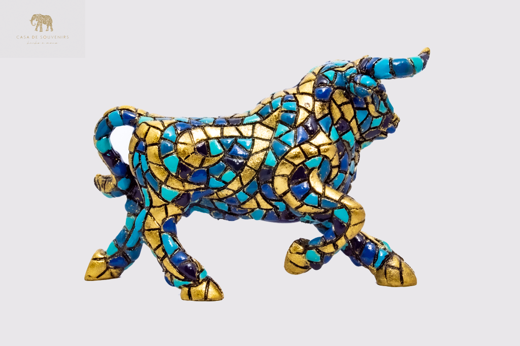 Golden Blue Bull statue made with marble dust and with enamel. It's the best collection in Spain.