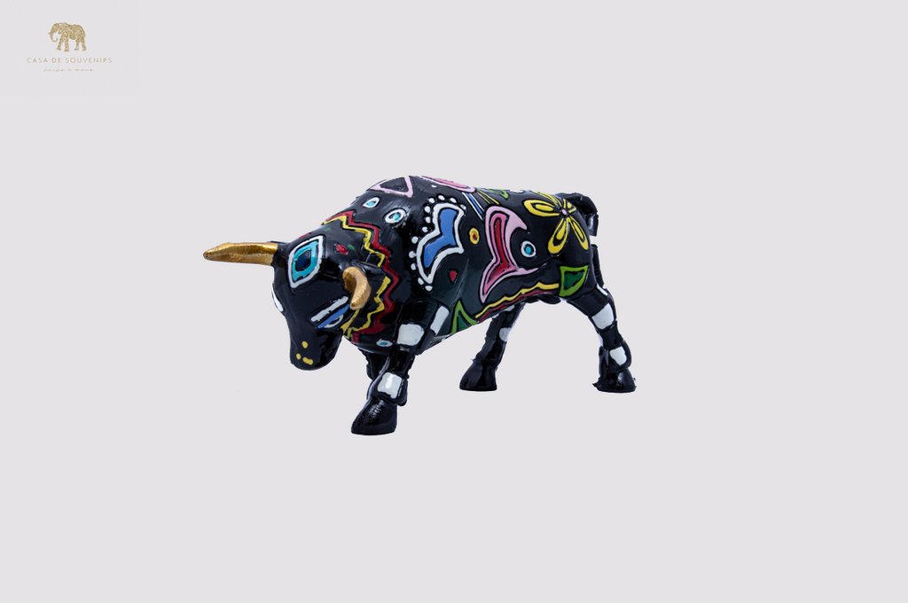 Hand Painted Black Bull statue with Gold Horns Tail made with marble dust and with enamel. It's the best collection in Spain.