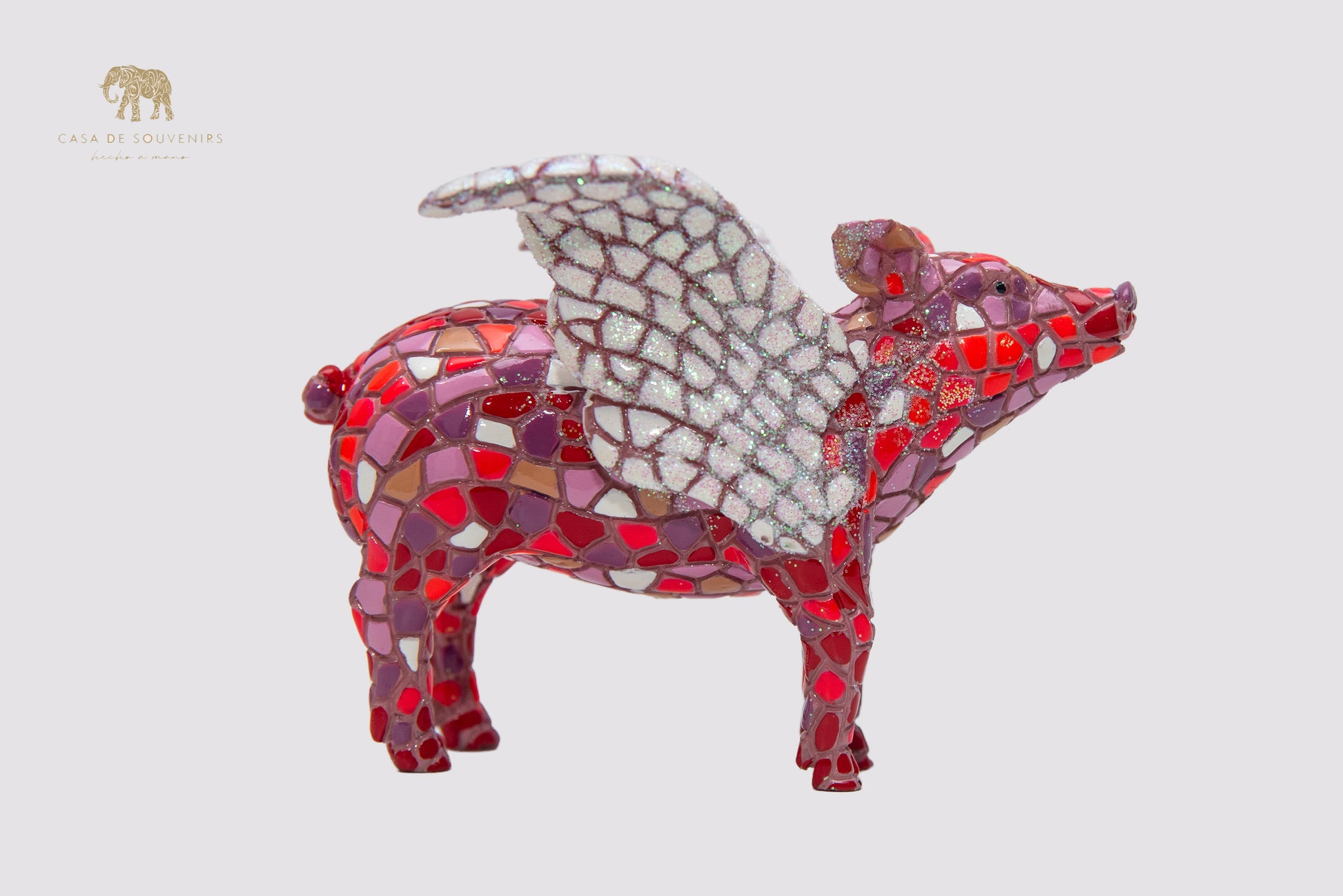 Mix Colors Pink Pig Flying statue made with marble dust and with enamel. It's the best collection in Spain.