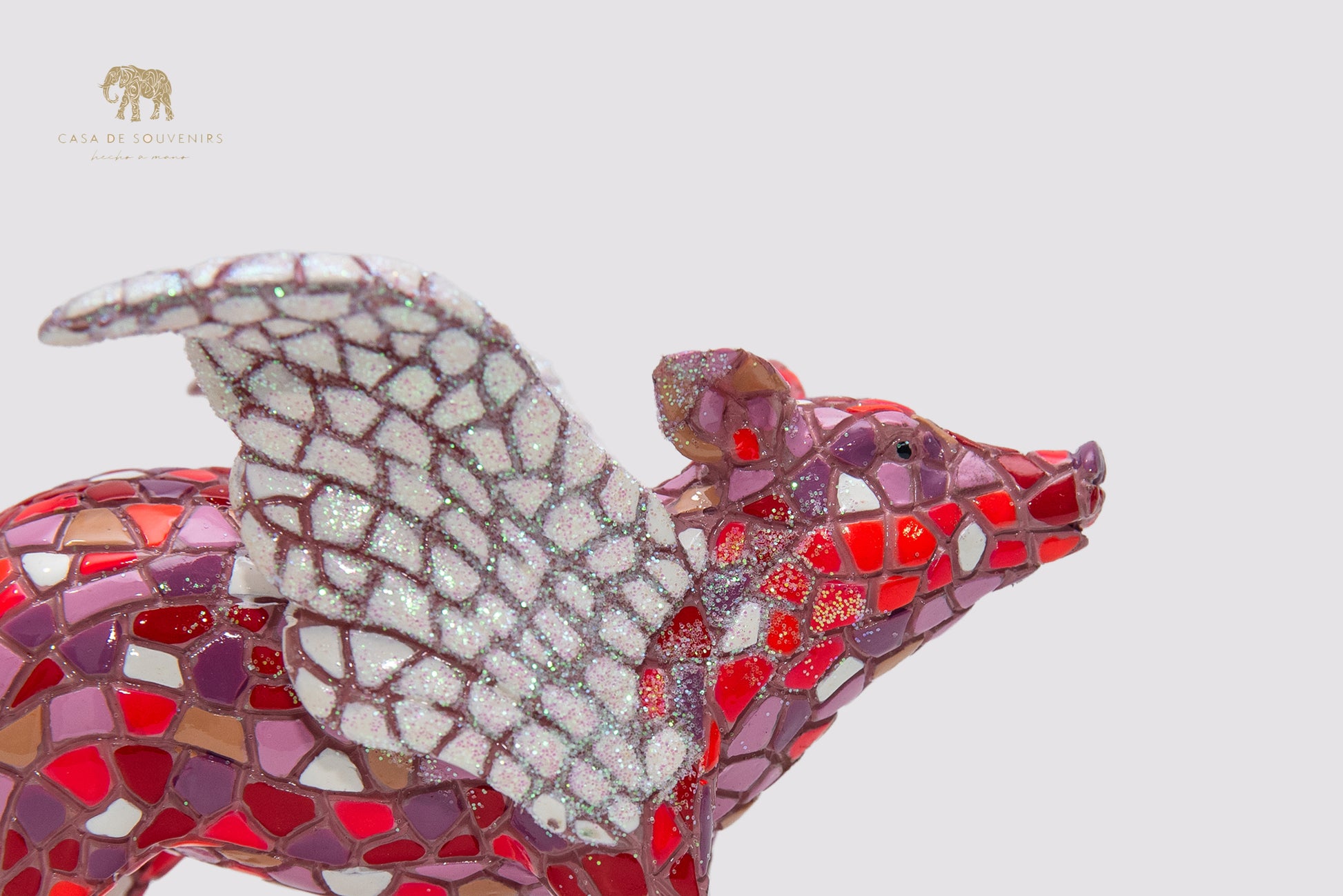 Mix Colors Pink Pig Flying statue made with marble dust and with enamel. It's the best collection in Spain.