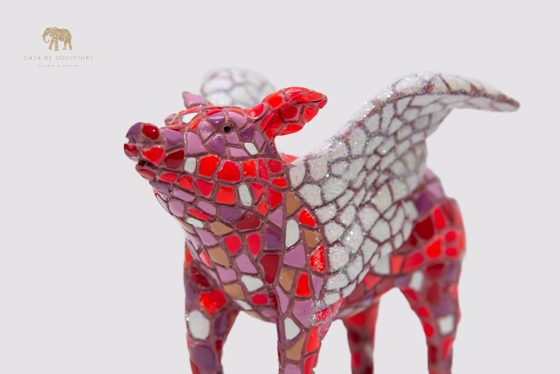 Mix Colors Pink Pig Flying statue made with marble dust and with enamel. It's the best collection in Spain.