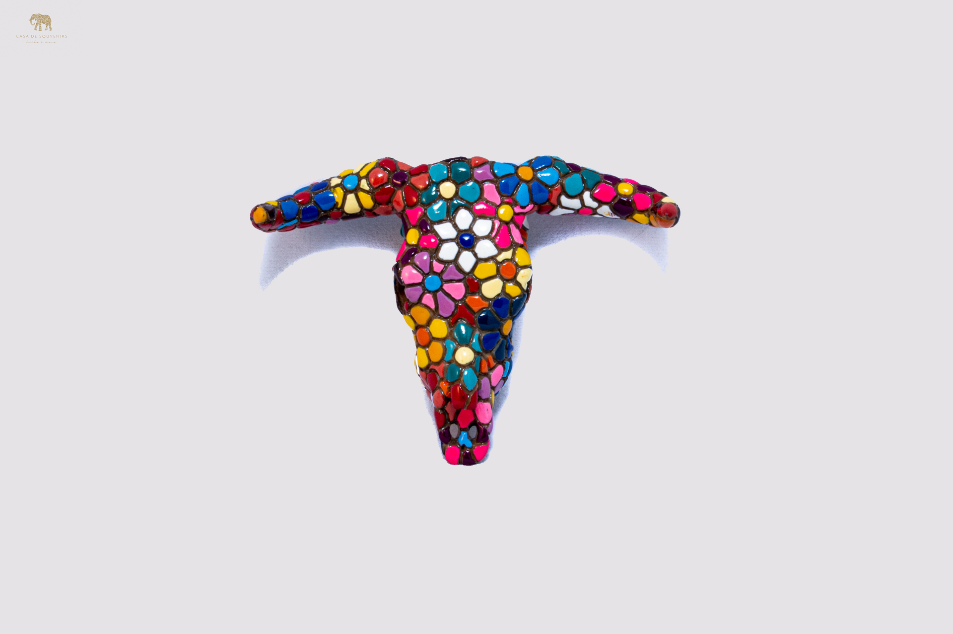 Flower Colored Bull Head Magnets statue made with marble dust and with enamel. It's the best collection in Spain.