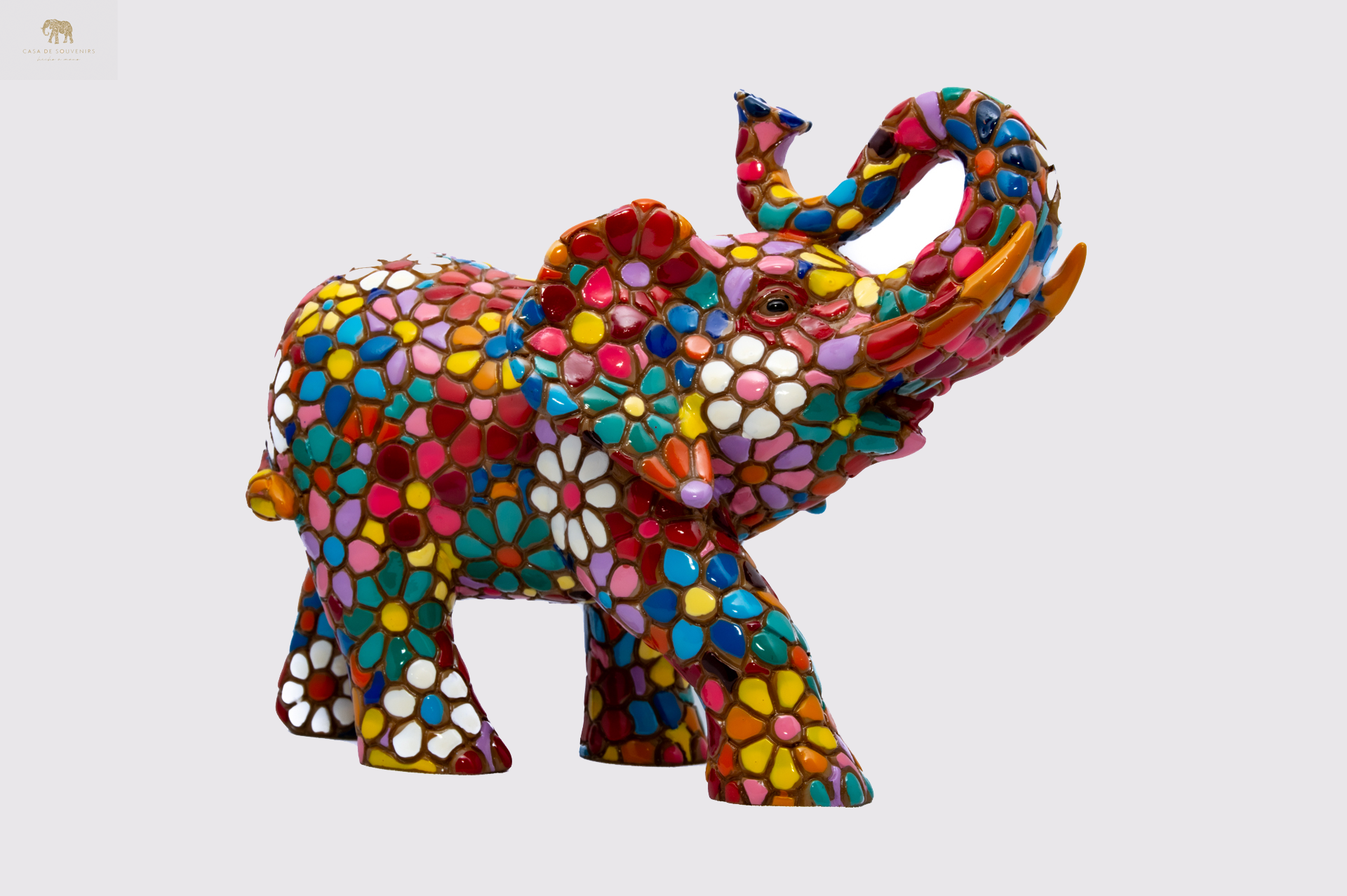 Flower Colores Elephant statue made with marble dust and with enamel. It's the best collection in Spain.