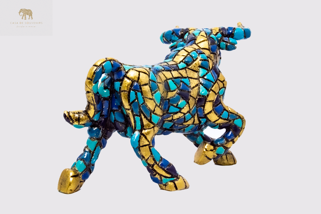 Golden Blue Bull statue made with marble dust and with enamel. It's the best collection in Spain.