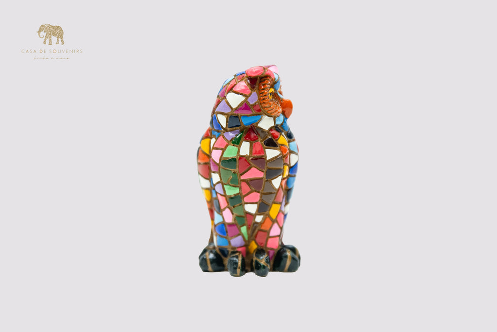 A Charming owl figurine, handcrafted in Spain and entirely hand-painted with a stunning mosaic pattern in vibrant.