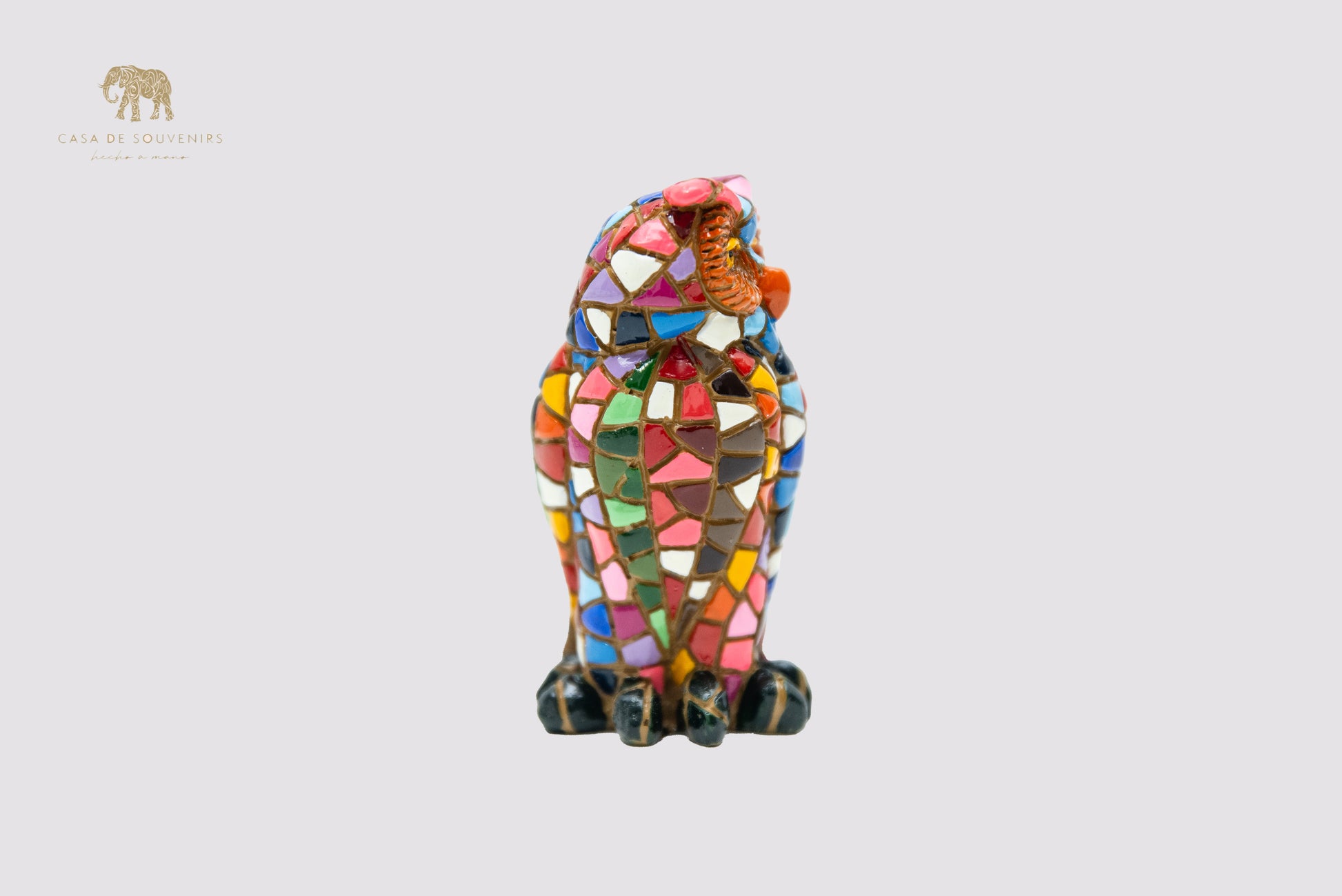A Charming owl figurine, handcrafted in Spain and entirely hand-painted with a stunning mosaic pattern in vibrant.