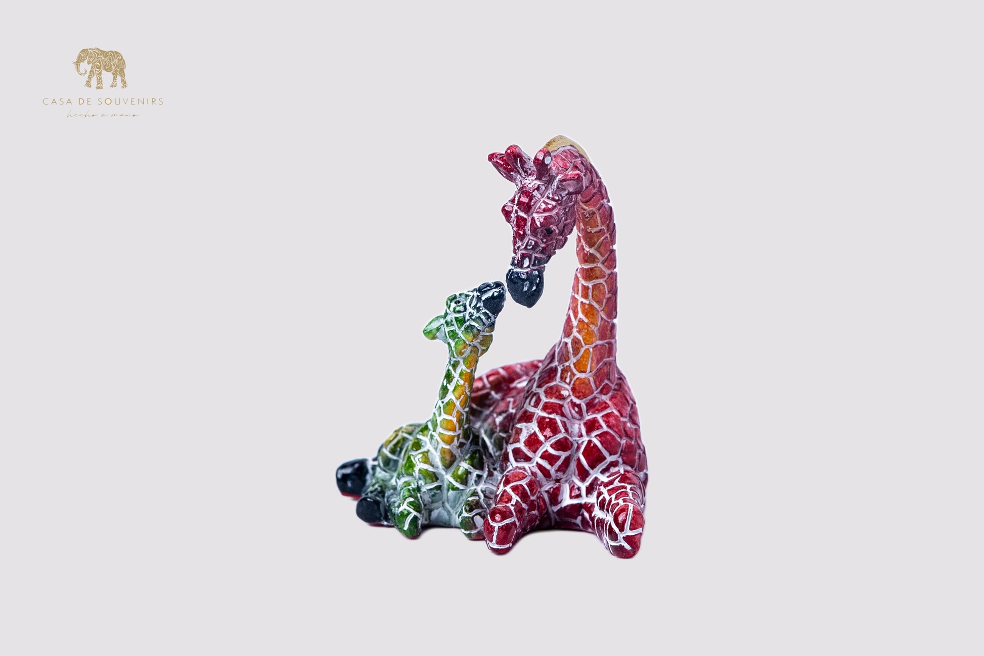 Couple giraffe Mix Colores statue made with marble dust and with enamel. It's the best collection in Spain.
