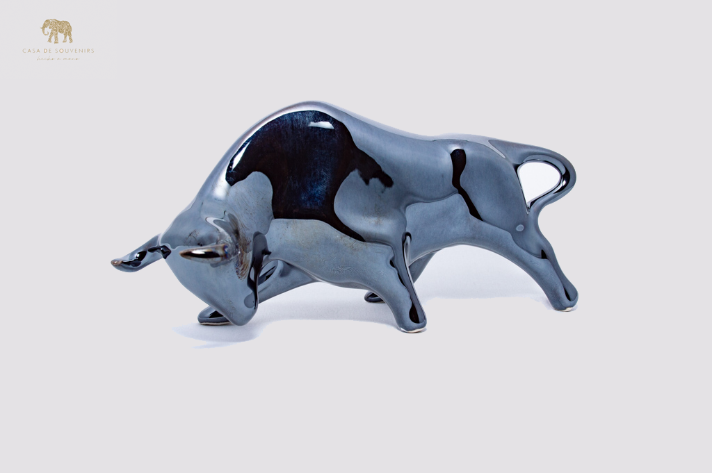 Black Bright Porcelain Bull statue made with porcelain dust and with enamel. It's the best collection in Spain.