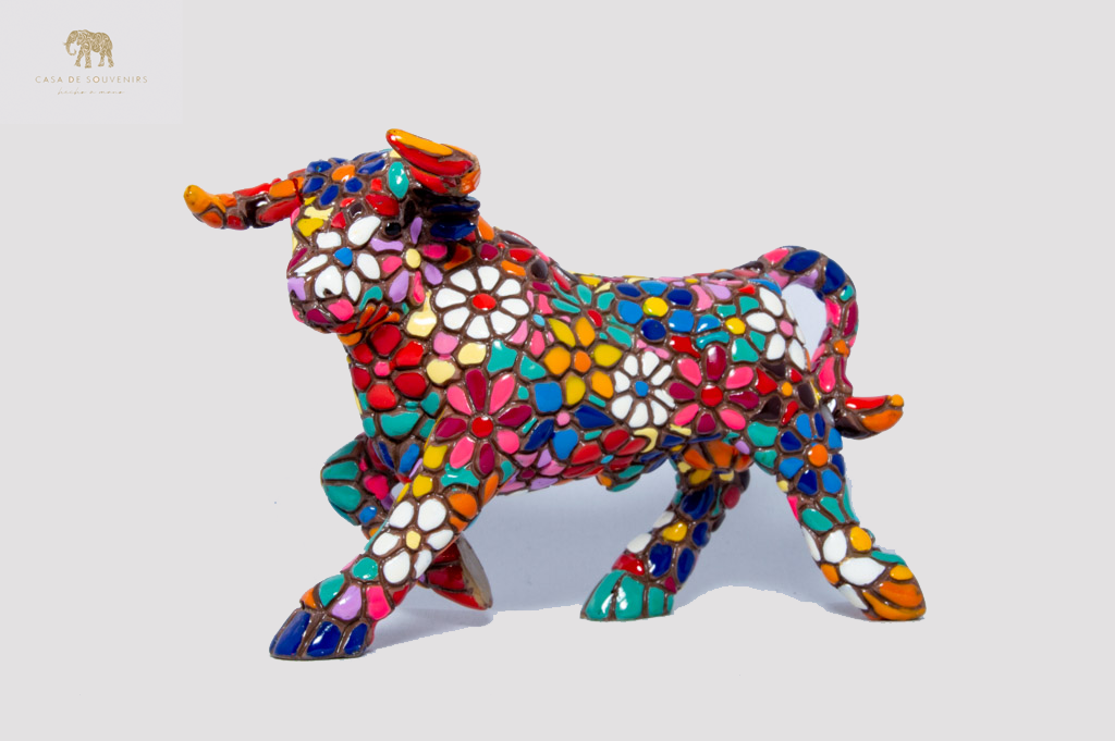 Flower Bull statue made with marble dust and with enamel. It's the best collection in Spain.